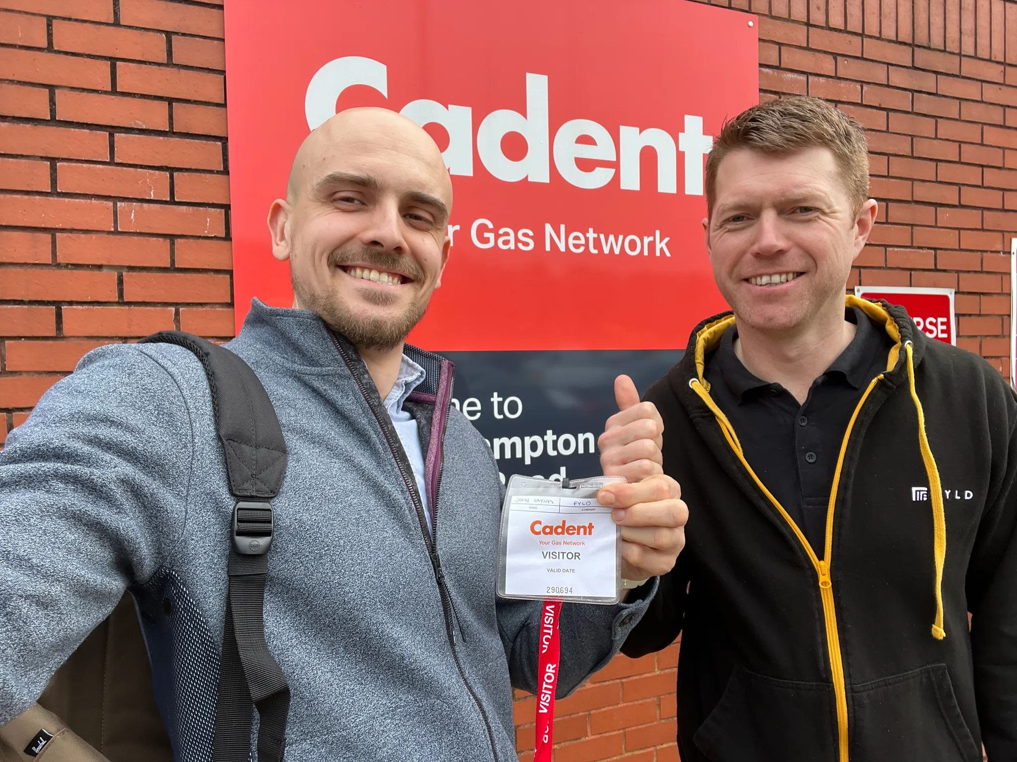 John Haynes with a colleague at a Cadent site visit, holding a visitor pass